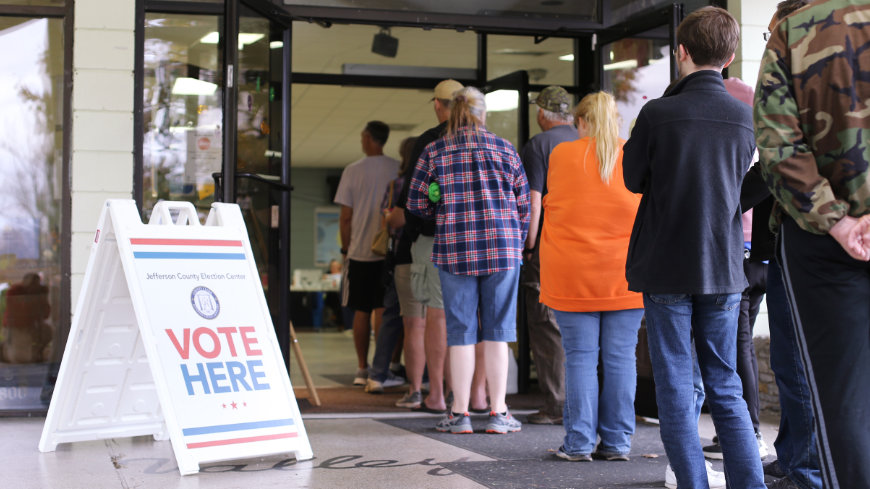 Voter in line